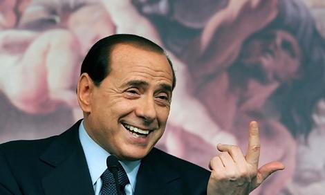      Hey Silvio, what;s with the shoe polish on your head. Your 70 years old...we don't believe that's your natural hair color. 