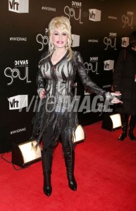 Dolly Parton. We love her to smithereens and only she is allowed to do this. Actually, she looks great... for her.