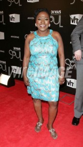 I love and own Sharon Jones' music, but someone please buy her CD. Sharon needs to afford a stylist.