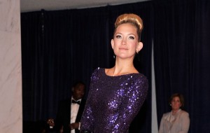 Wht's with the pregnant bagel on Kate Hudson's head?