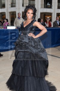 That is waaayyy too much dress June Ambrose. And if you are preganat... no.